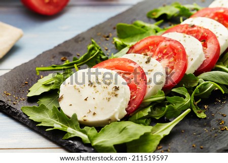 caprese salad with rocket instead of basil