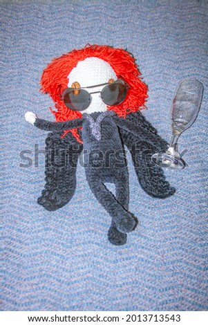 Little cute plush demon inspired with Good Omens Foto d'archivio © 