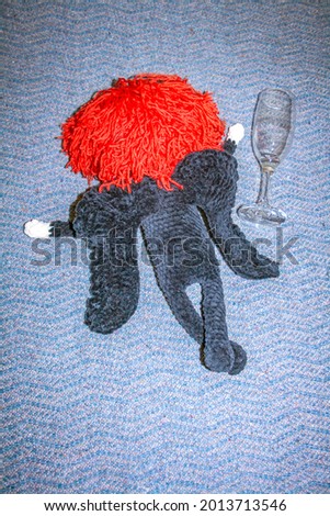 Little cute plush demon inspired with Good Omens Foto d'archivio © 
