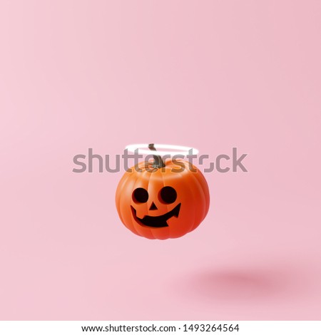 Halloween pumpkin with halo angel on pastel pink background. Creative idea. Minimal concept. 3d rendering