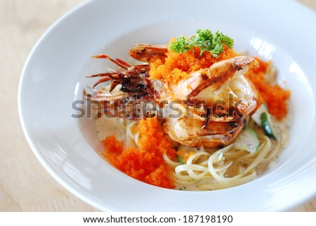 close up prawn pasta cream sauce with flying fish roe