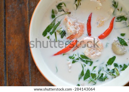 Top view of coconut milk soup with shrimp and local vegetable