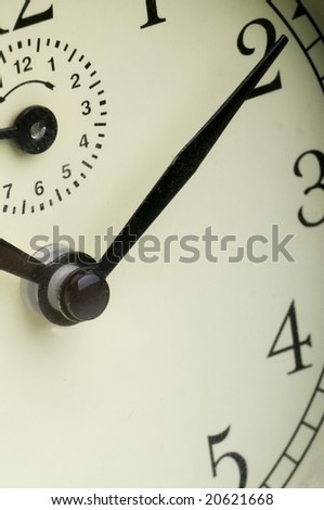 Retro clock closeup  showing on ten past ten