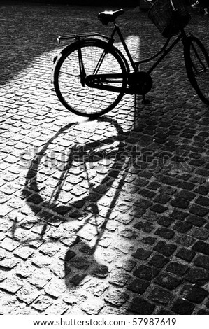 Black and white shadow of amsterdam bike