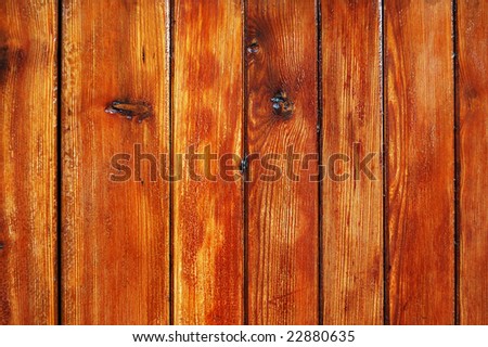Worn out varnished wooden fence texture