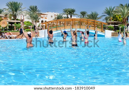 Sharm El - Sheikh, Egypt. Sinai - 02 October:  Group of people doing exercises in the pool.  Hotel Royal Grand Sharm, city Sharm El - Sheikh, Egypt. Sinai - October 02, 2013