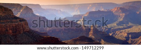 This majestic sunset photo at the South Rim of the Grand Canyon captures the amazing layers of landscape and quality of light.