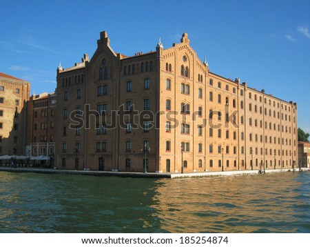 Majestic high-rise office building of red brick. Capitol. Venice. Italy