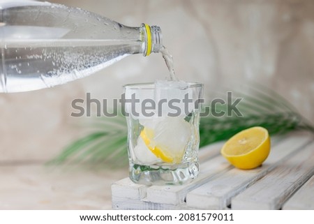 Similar – Foto Bild Glas mit Tonic Water auf blauem Hintergrund.