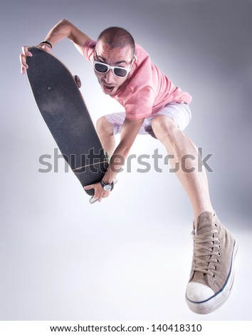 crazy guy with a skateboard making funny faces
