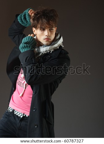 Attractive young male model posing in the studio