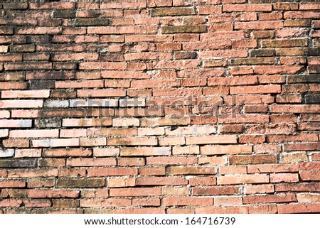 old brick brown wall of city in thailand history background seamless texture