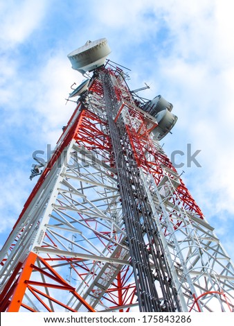 High microwave mobile pole station with blue sky, telecommunication industry