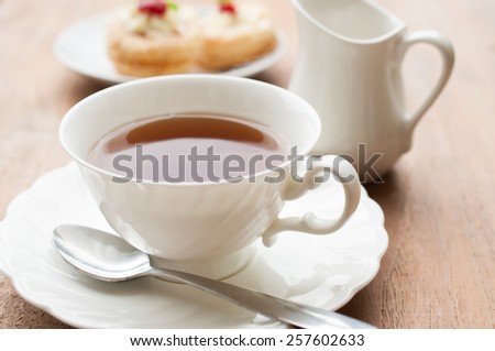A cup of whole leaf lapsang souchong tea, a rich smoky flavored tea