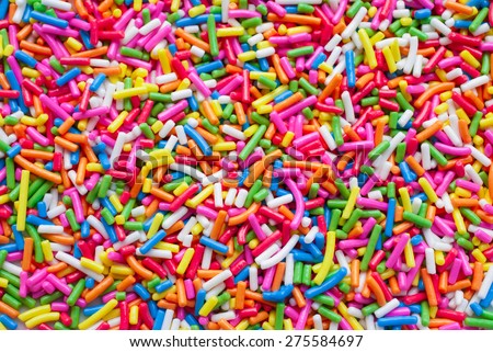 Sugar sprinkle dots, decoration for cake and bekery, a lot of sprinkles as a background