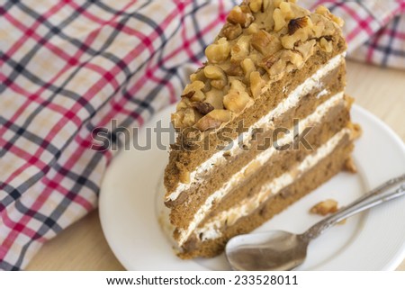 Rich caramel mocha cake with walnuts on top