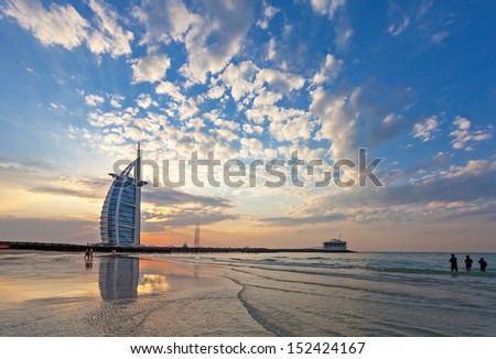 DUBAI, UAE, JANUARY 1: Burj Al Arab on Jumeirah Beach after a big thunderstorm. After the storm all what remains are spectacular clouds in the sky. New Years Day January 01, 2010