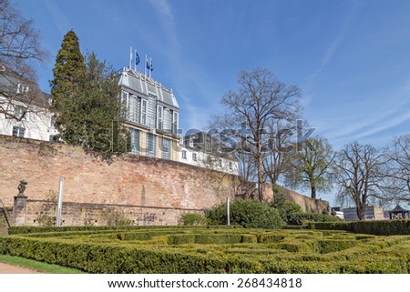SAARBRUCKEN, GERMANY - APRIL 10: The garden of the castle in Saarbrucken on a sunny spring day. April 10, 2015 in Saarbrucken, Germany