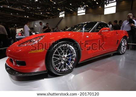 PARIS - OCTOBER 13 : People look at the Corvette at the 2008 Paris Motor Show October 13, 2008 in Paris. The show attracts more of one million people every 2 years