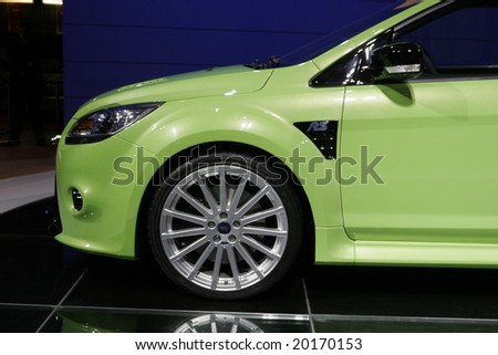 PARIS - OCTOBER 13 : People look at the Ford Focus RS at the 2008 Paris Motor Show October 13, 2008 in Paris. The show attracts more of one million people every 2 years