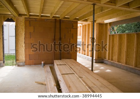 part of a wood and brick house construction