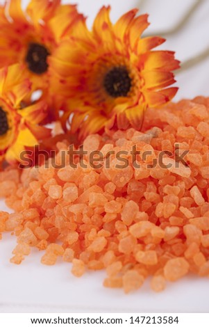 Aromatherapy and relaxation - colorful orange bath salt