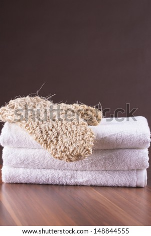 Clean and fresh idea - massage glove and white towels
