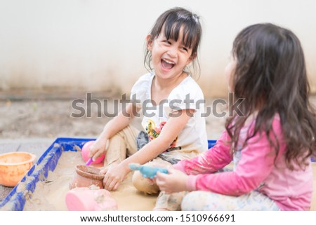 Similar – Foto Bild Zwei kleine Kinder spielen ins Meer