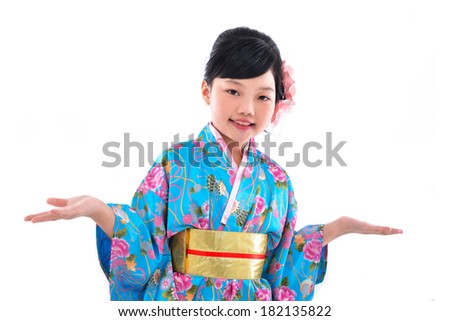 Smiling little girl makes open palm gesture