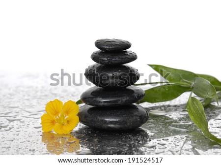 Spa Background with Bamboo and stones with yellow flower