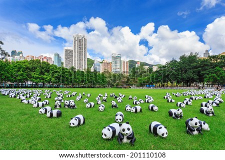 HONG KONG, JUNE 19: 1600 Pandas World Tour in Hong Kong inVictoria Park on 19 June 2014. part of pandas world tour, designed by French artist Paolo Grangeon