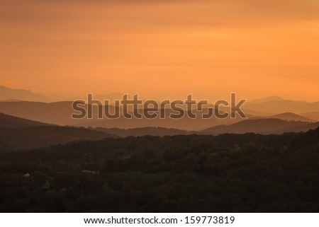 VIENNA, AUSTRIA - OCTOBER 19: Looking west from Kahlenberg into the sunset and towards the Vienna Woods shown on 19 October 2013 in Vienna. The area is densely wooded and popular for recreation.