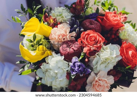 Similar – Image, Stock Photo Different flowers in water on table in workshop