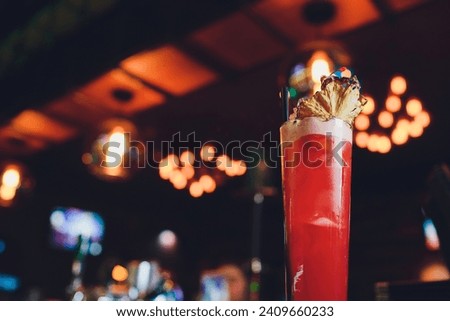 Similar – Image, Stock Photo Fresh colorful exotic alcoholic cocktail with orange and rosemary on the bar desk. Tasty Soft drink with fruits. selective focus
