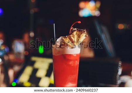 Similar – Image, Stock Photo Fresh colorful exotic alcoholic cocktail with orange and rosemary on the bar desk. Tasty Soft drink with fruits. selective focus