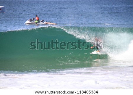 PENICHE, PORTUGAL - OCT 13: Joel Parkinson tube riding a wave in round 1, heat 6 at WCT contest, Rip Curl Pro in Peniche, Portugal on October 13, 2012