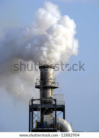 Air Pollution - Smoke from chimney polluting the air