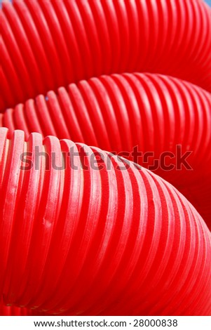 Red plastic pile of pipes