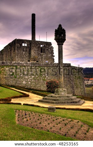 Barcelos city castle in the afternoon under dark cloudy sky (HDR photo)