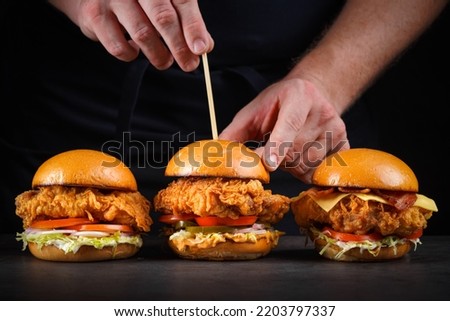 Similar – Image, Stock Photo Tasty hamburger served in restaurant