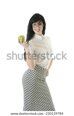 Young attractive teacher holding green apple isolated on white background