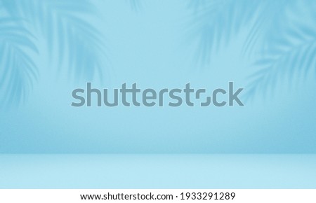 Empty palm shadow blue color texture pattern cement wall background. Used for presentation  business nature organic cosmetic products for sale shop online. Summer tropical beach with minimal concept