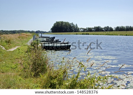 Rowing boats in the river Oude IJssel in the Netherlands