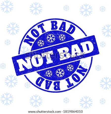 Not Bad round stamp seal on winter background with snowflakes. Blue vector rubber imprint with Not Bad text with grunged texture for Christmas. Grunge text seal imprint with grunge effect. Сток-фото © 