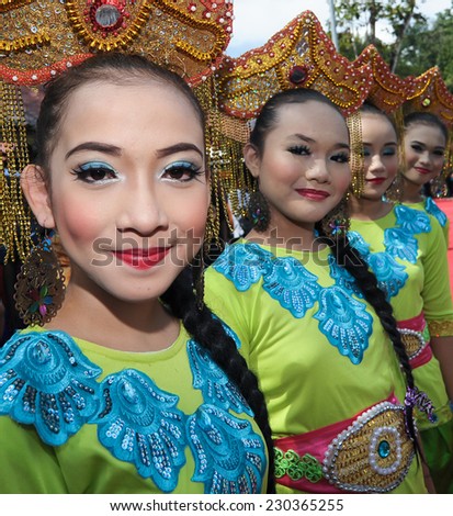 Kota Belud, Sabah Malaysia  - October 26, 2014 : Bajau ladies in traditional costume pose for the camera during Tamu Besar festival in Kota Belud Sabah, Malaysia.