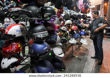 Ho Chi Minh, Vietnam - June 14, 2014.Various type of motorcycle helmets on display at one shop in the city on June 14, 2014. For most tourist the city is better known for its millions of motorcycles.