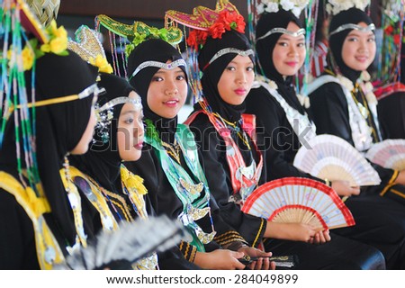 Penampang, Sabah Malaysia.May 31, 2015 : A group of Bisaya girls in their traditional costume during Pesta Kaamatan or harvest festival in Penampang Sabah Malaysia. Selective focus image.