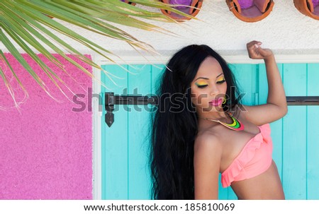 Tropical summer holiday fashion beauty concept, attractive woman with artistic make up