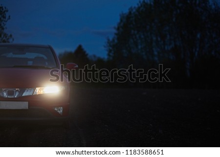 Similar – Image, Stock Photo Car riding along dirty road in evening forest