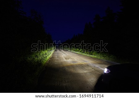 Similar – Image, Stock Photo Car riding along dirty road in evening forest